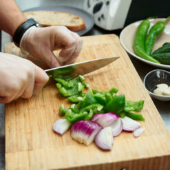 Chef preparing Vegetables wearing gloves