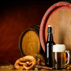 Beer barrel, pretzel, and pint of beer